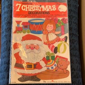Christmas “cut-out” decor for wall, window, door
Seven pieces; circa 1980s